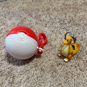 Vintage BurgerKing 1999 Red and White Ball with Charizard Figure